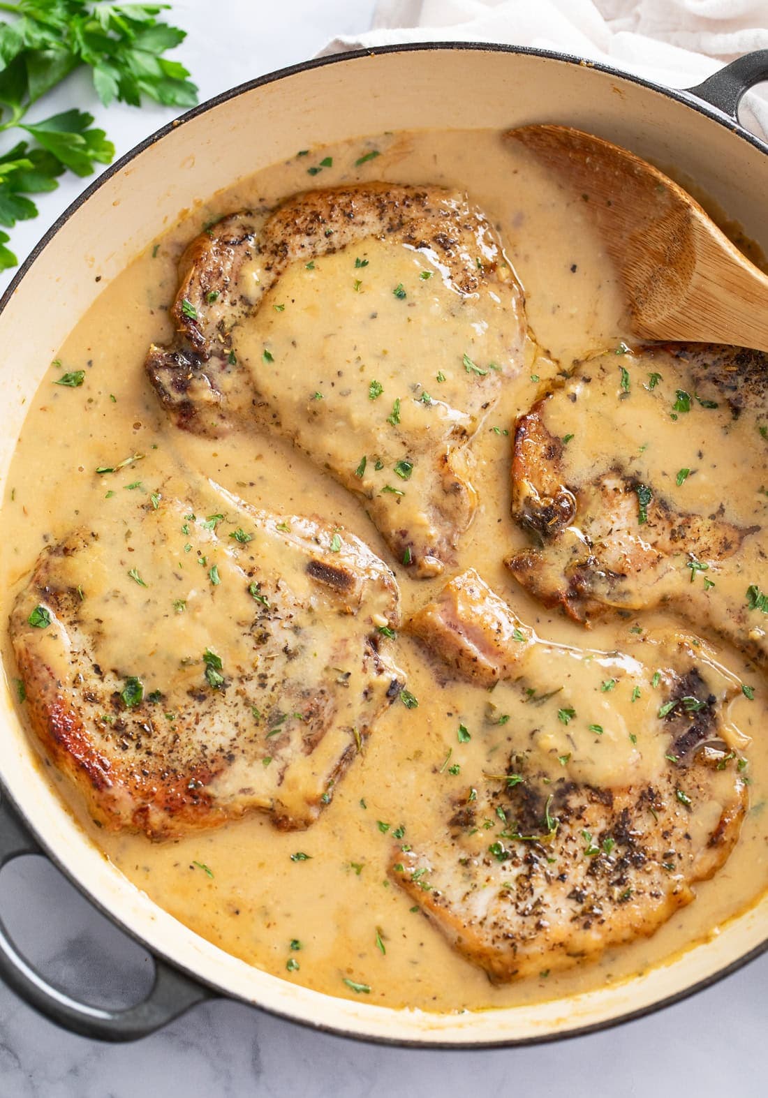 Garlic Parmesan Pork Chops with White Wine Cream Sauce